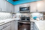 upgraded kitchen cabinets, tile back splash, stainless steel appliances, blender